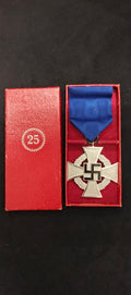 25 Jahre Dienstkreuz in einem Koffer